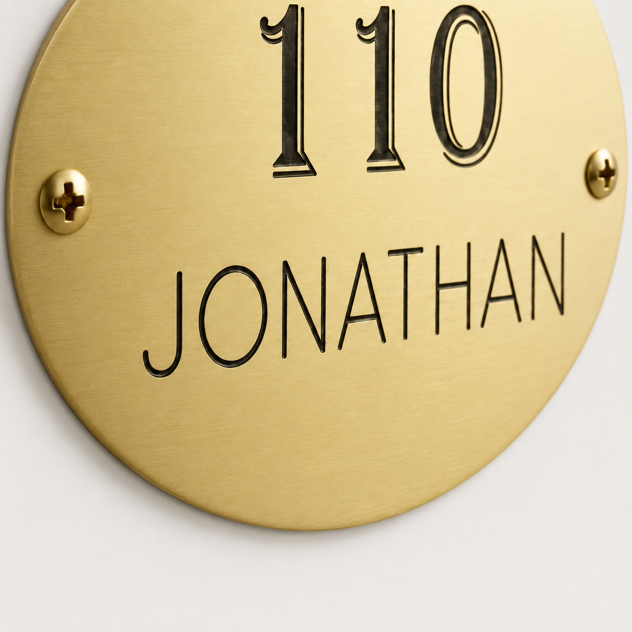 Personalized oval brass plaque for home or office