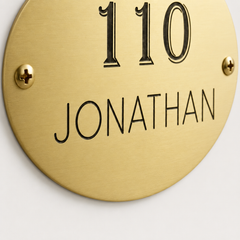 Personalized oval brass plaque for home or office