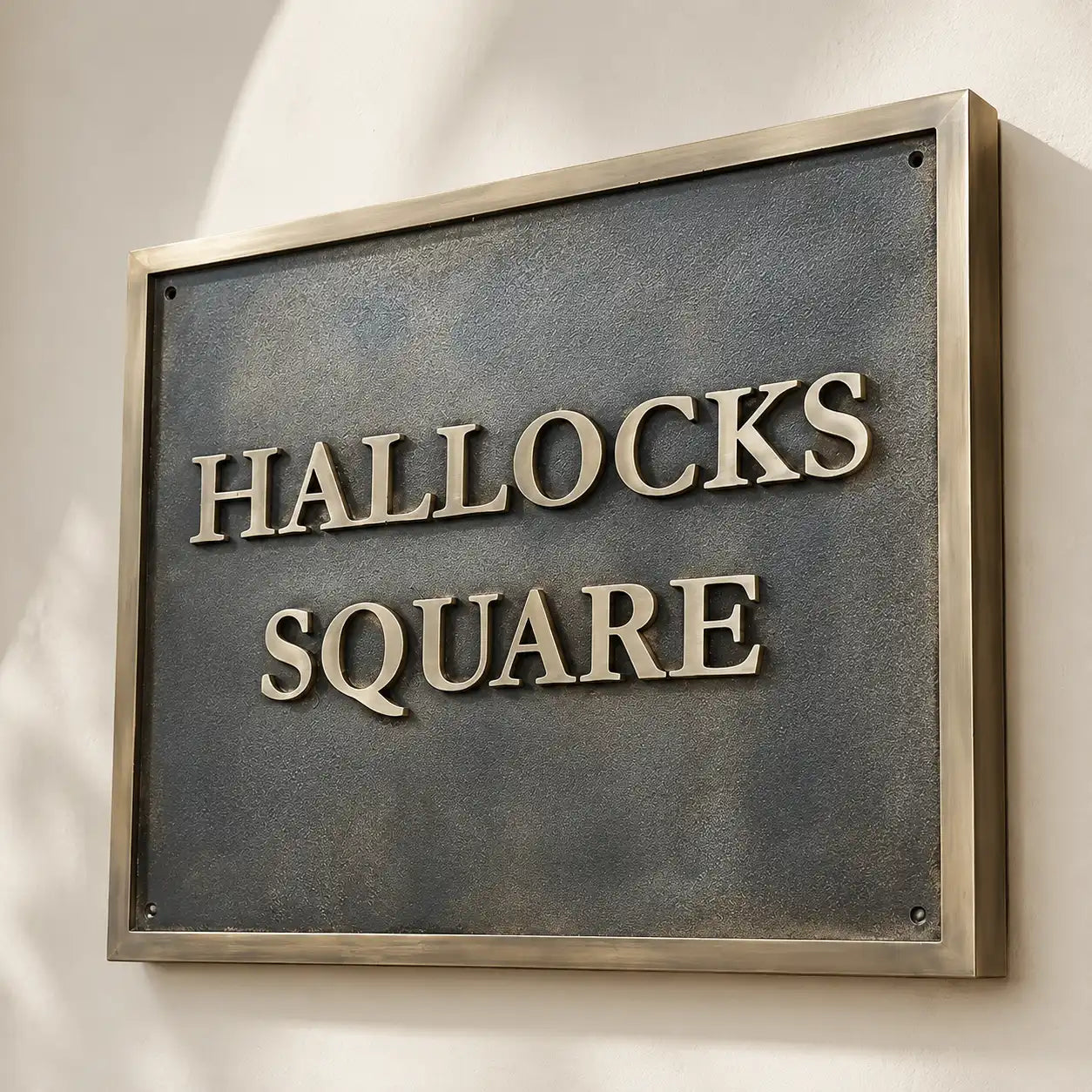 Custom brass address plaque for home entrance