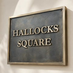 Custom brass address plaque for home entrance