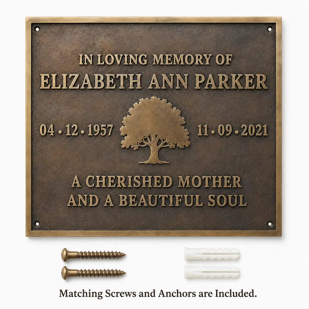 Personalized Bronze Plaque with two screws and two wall plugs arranged beneath the product.