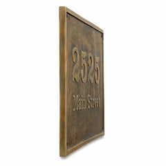 Custom brass oval plaque with house number for outdoor display