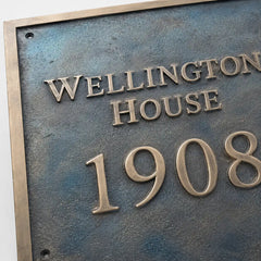 Custom engraved bronze plaque for outdoor signage