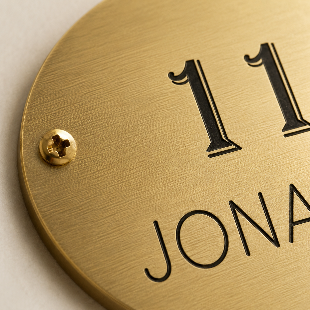 Engraved oval brass plaque for home entrance or business