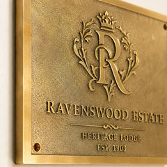 Custom engraved brass house address plaque with personalized logo