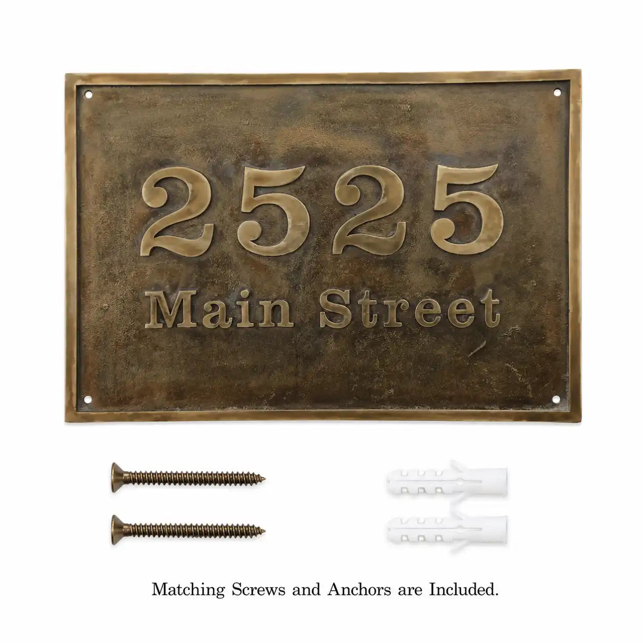 Oval brass house number sign with personalized address details