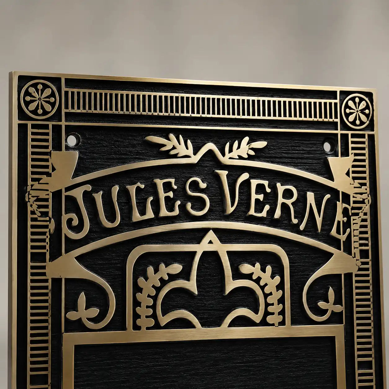 Personalized brass wall sign with black and silver finish