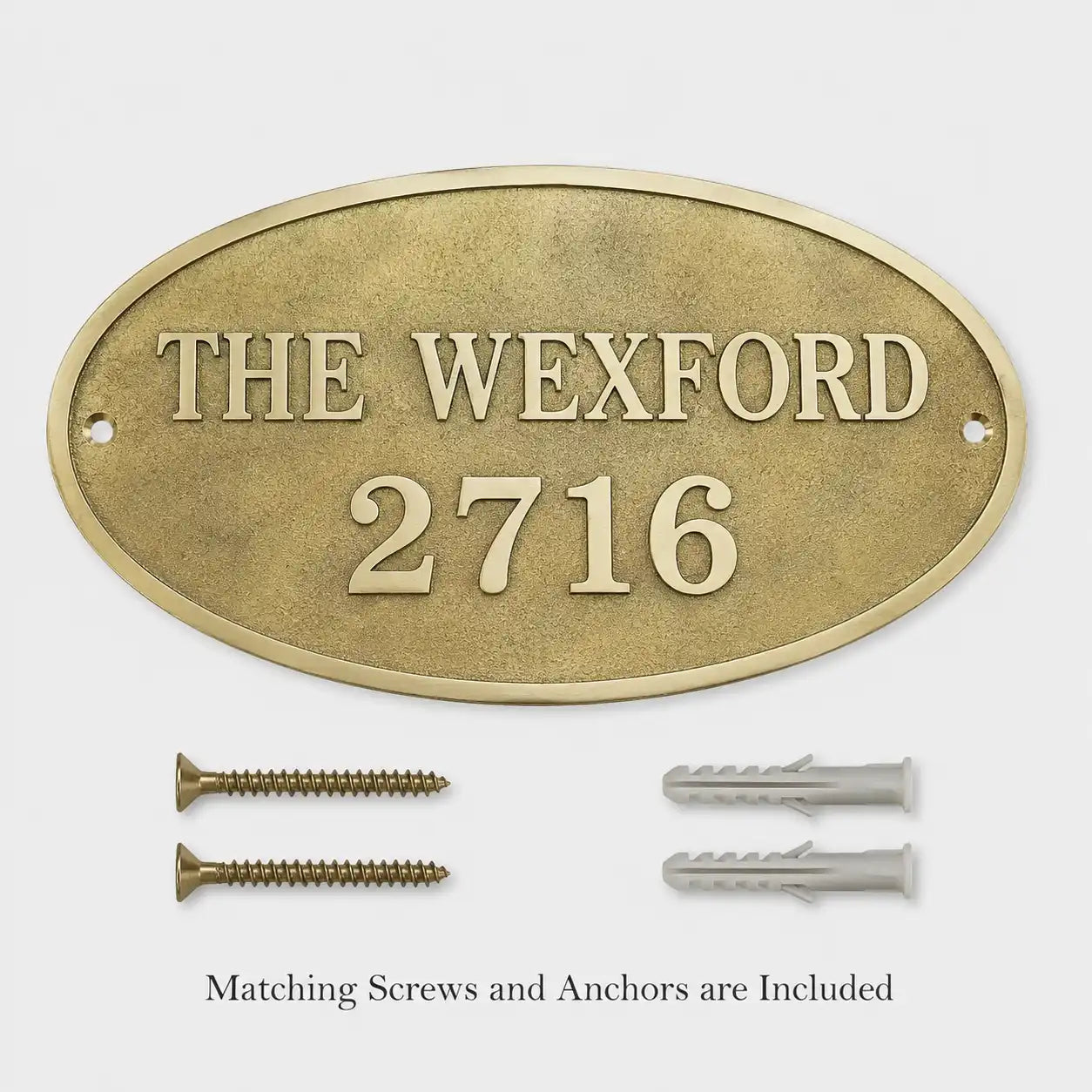 Outdoor Bronze Address Plaque shown with included screws and anchors for brick, stone or concrete walls.