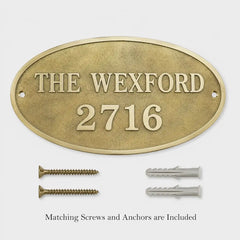 Outdoor Bronze Address Plaque shown with included screws and anchors for brick, stone or concrete walls.
