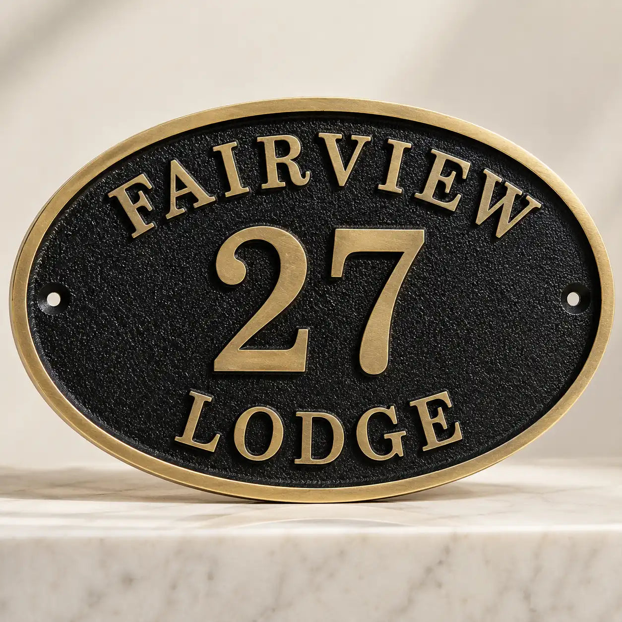 Personalized bronze oval address sign with engraved family name