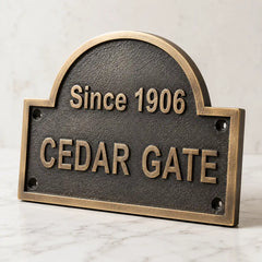 Engraved bronze address plaque with custom house number and family name