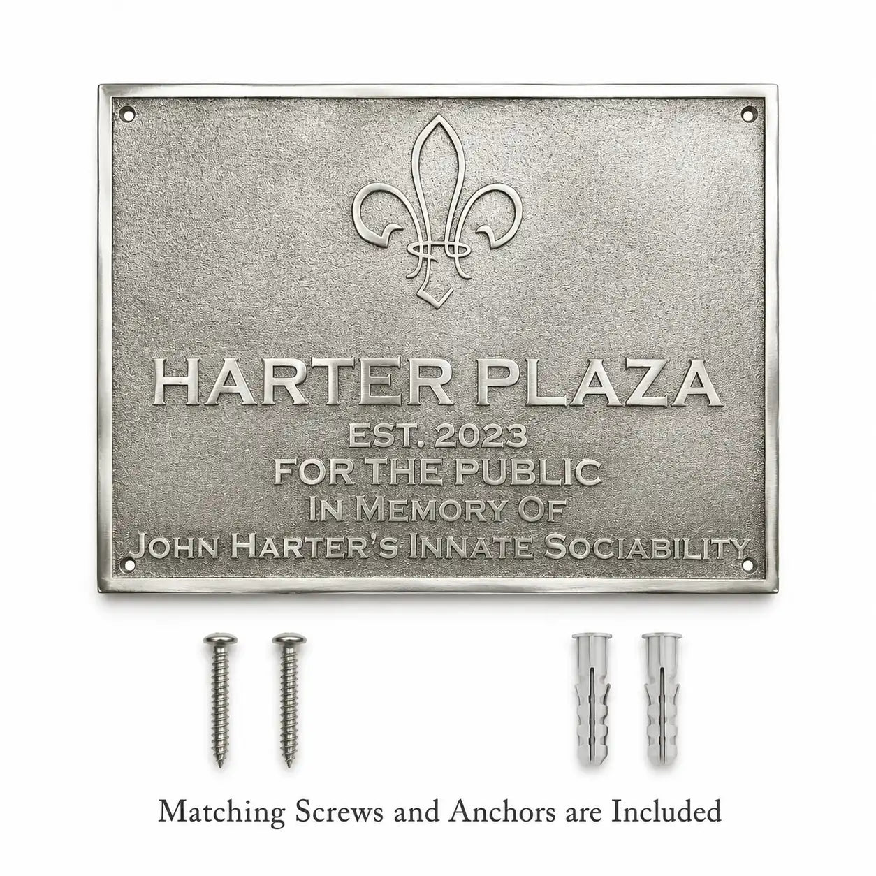 Custom Bronze Memorial Plaque displayed alongside included mounting hardware for secure wall installation.