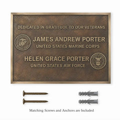 Cast Bronze Plaque with two screws and two wall plugs arranged neatly beneath the product.