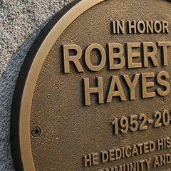Custom oval bronze memorial plaque for lasting remembrance