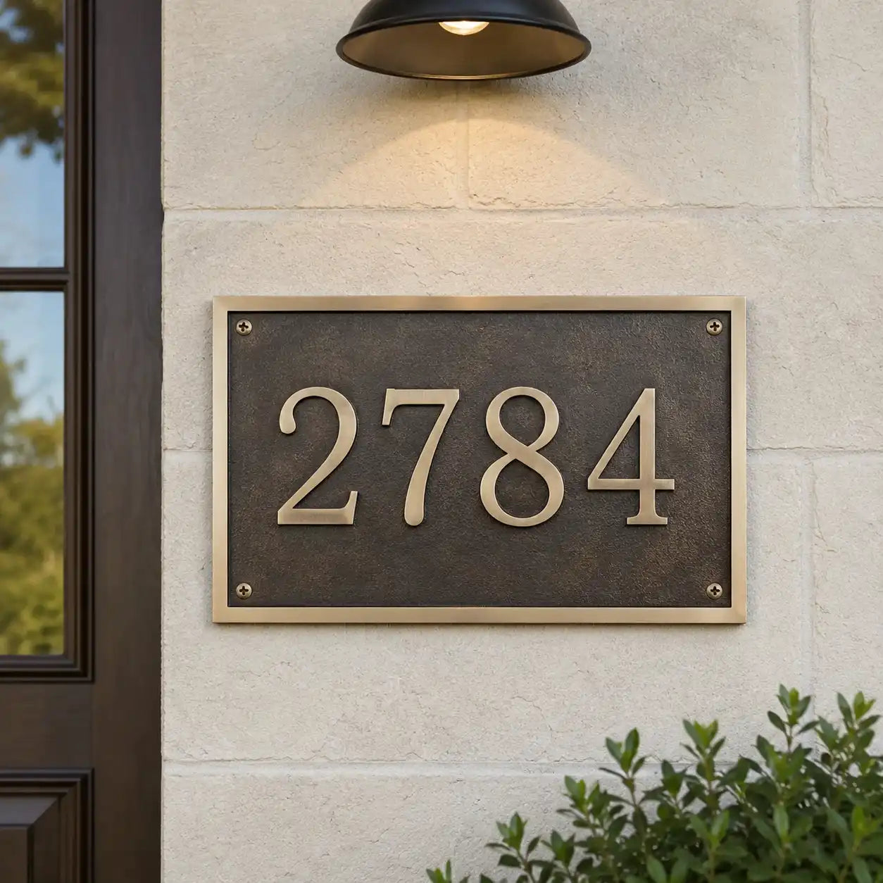 Personalized brass plaque with black and silver engraved design
