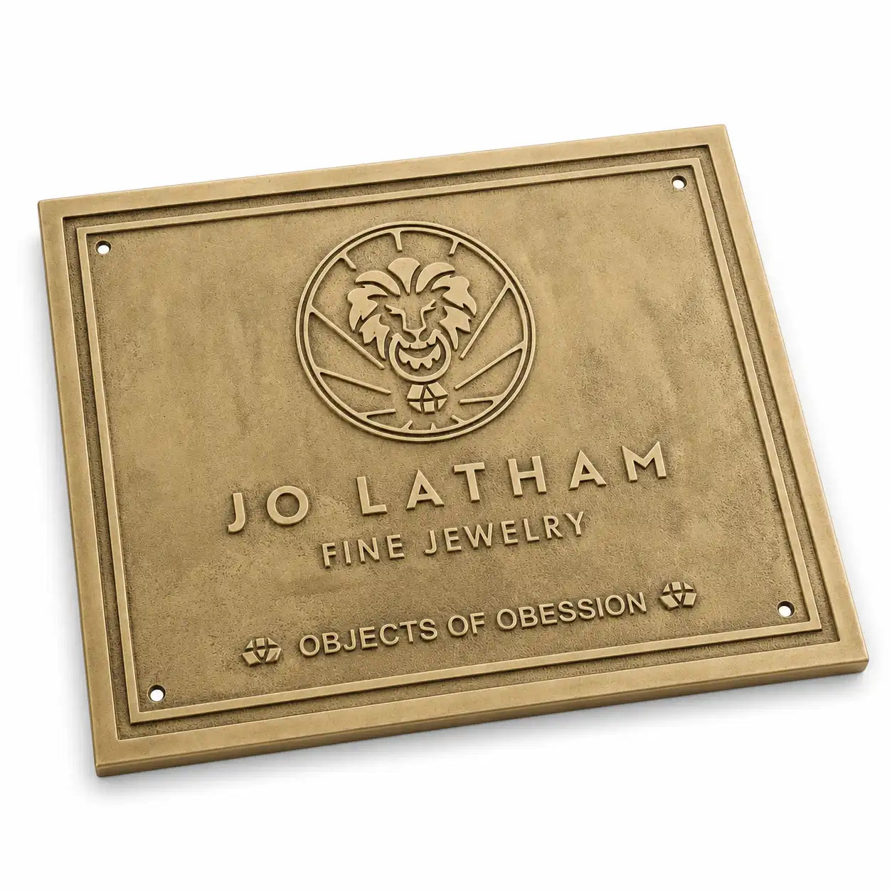 Custom brass address plaque with engraved name, street address, and house number