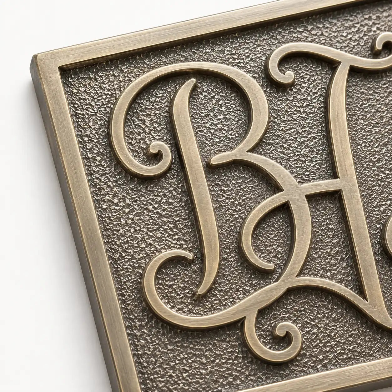 Personalized brass and bronze plaques for memorials, business signs, and dedications