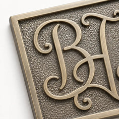 Personalized brass and bronze plaques for memorials, business signs, and dedications