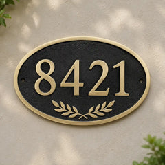 Personalized brass oval sign with engraved house number and name