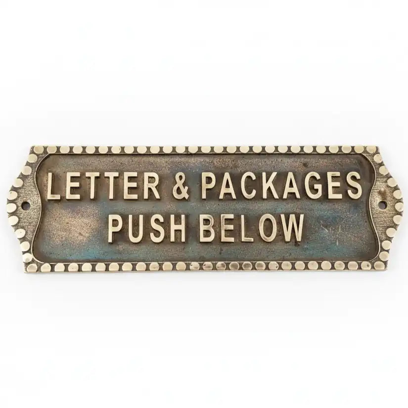 Decorative Brass nameplate with custom text on a white background