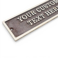 Customizable metal sign with text placeholder on a white background