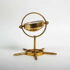 Gold decorative object on a white background