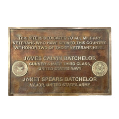 Bronze plaque honoring James Calvin Batchelor and Janet Spears Batchelor, a gunner's mate third class and major from the United States Navy and Army respectively.