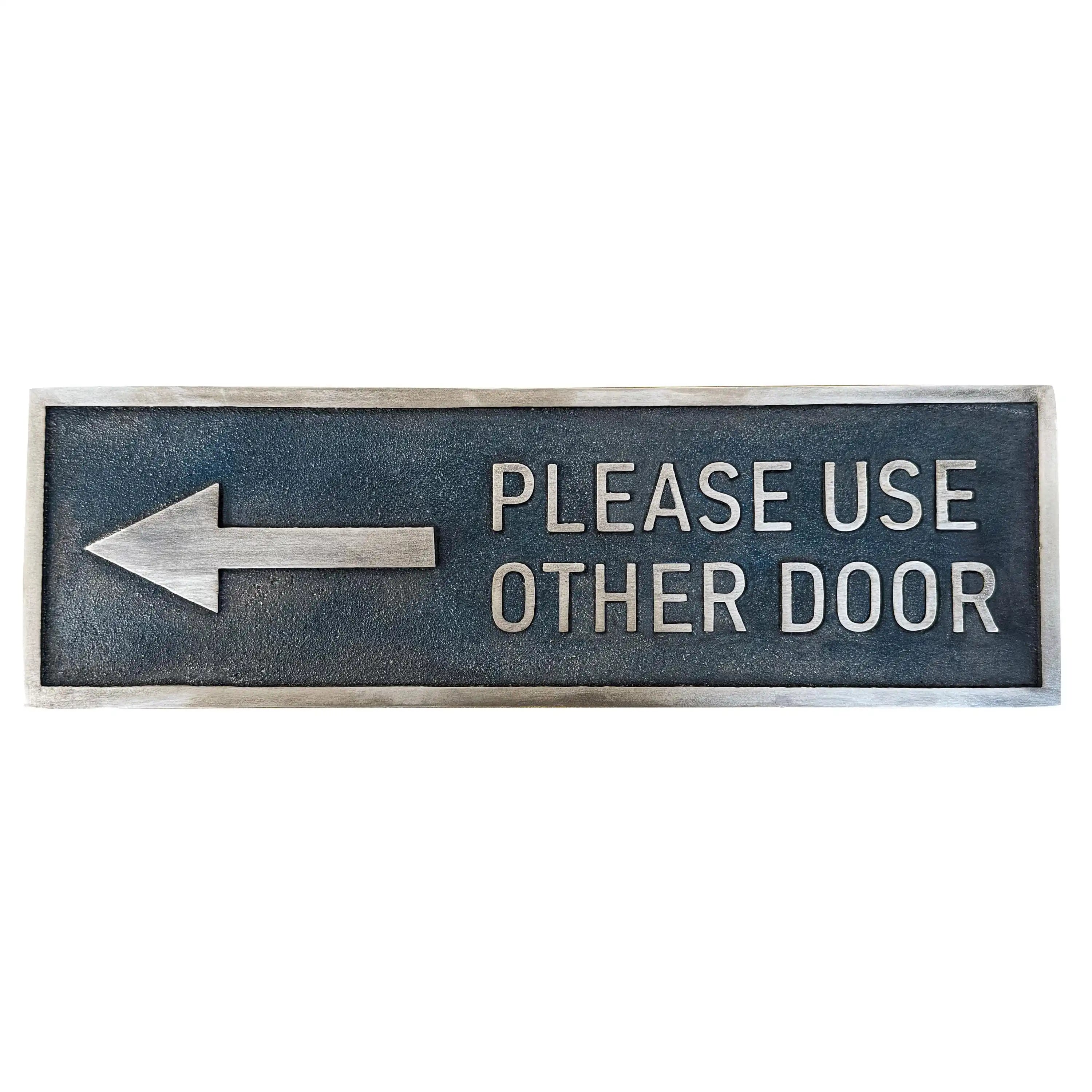 Bronze Door Sign with an arrow pointing left and text 'Please Use Other Door' on a white background