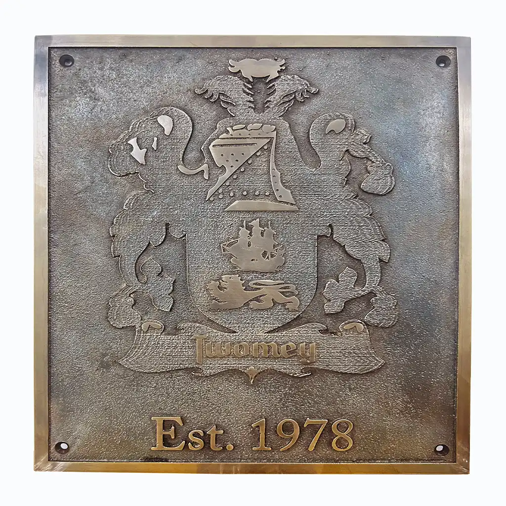 Custom vintage bronze plaque with a crest and 'Est. 1978' text on a white background