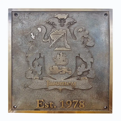Custom vintage bronze plaque with a crest and 'Est. 1978' text on a white background