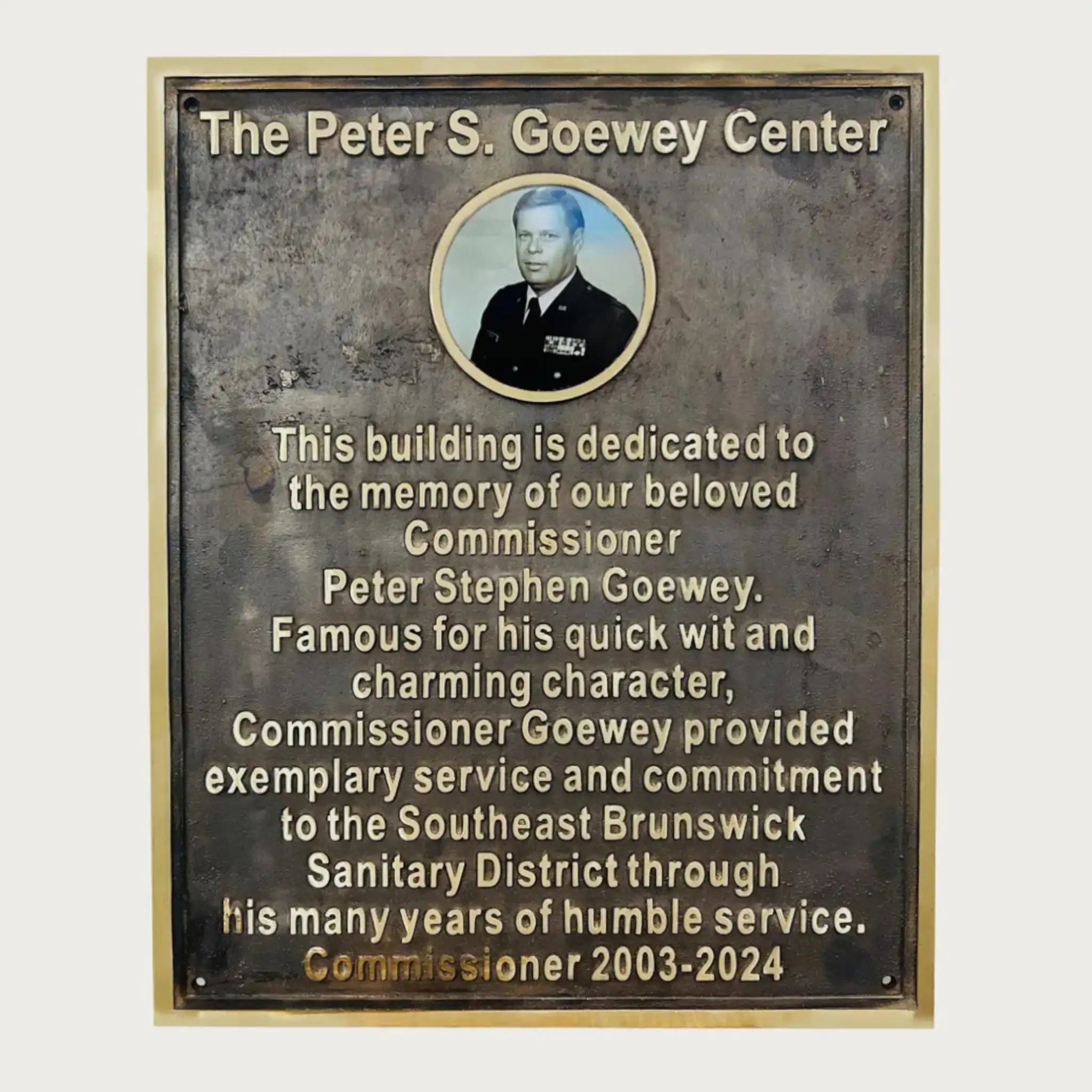 Plaque dedicated to Commissioner Peter Stephen Goewey at The Peter S. Goewey Center.