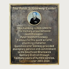 Plaque dedicated to Commissioner Peter Stephen Goewey at The Peter S. Goewey Center.