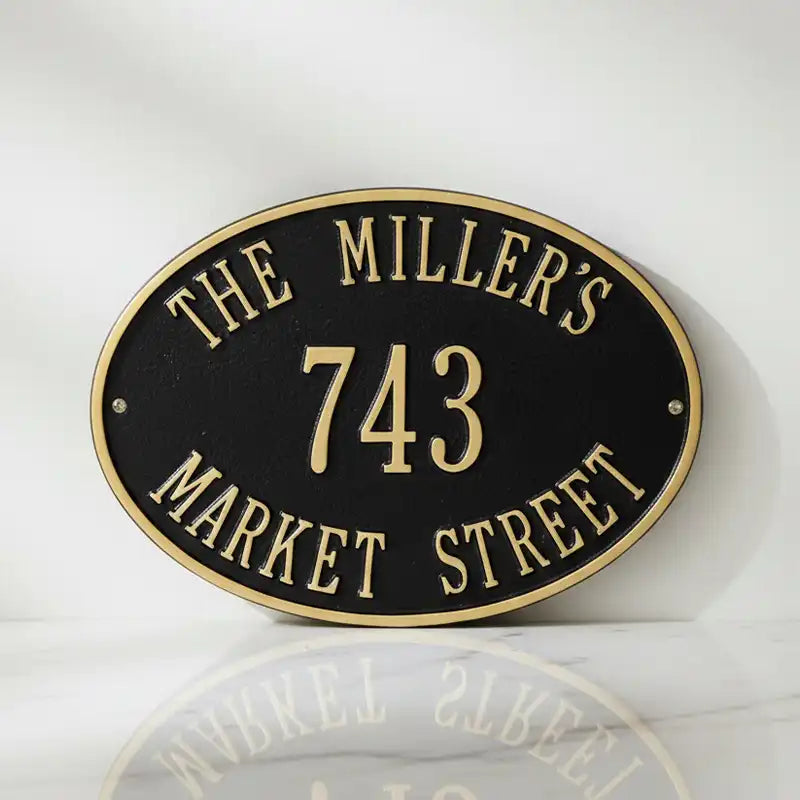 Address plaques bronze, black, and gold house address sign with text on a white background