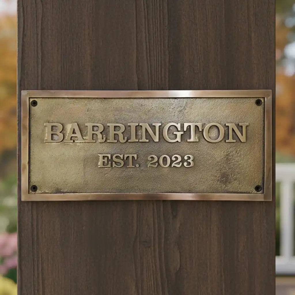 Bronze plaque on a wooden post,
Bronze name plates