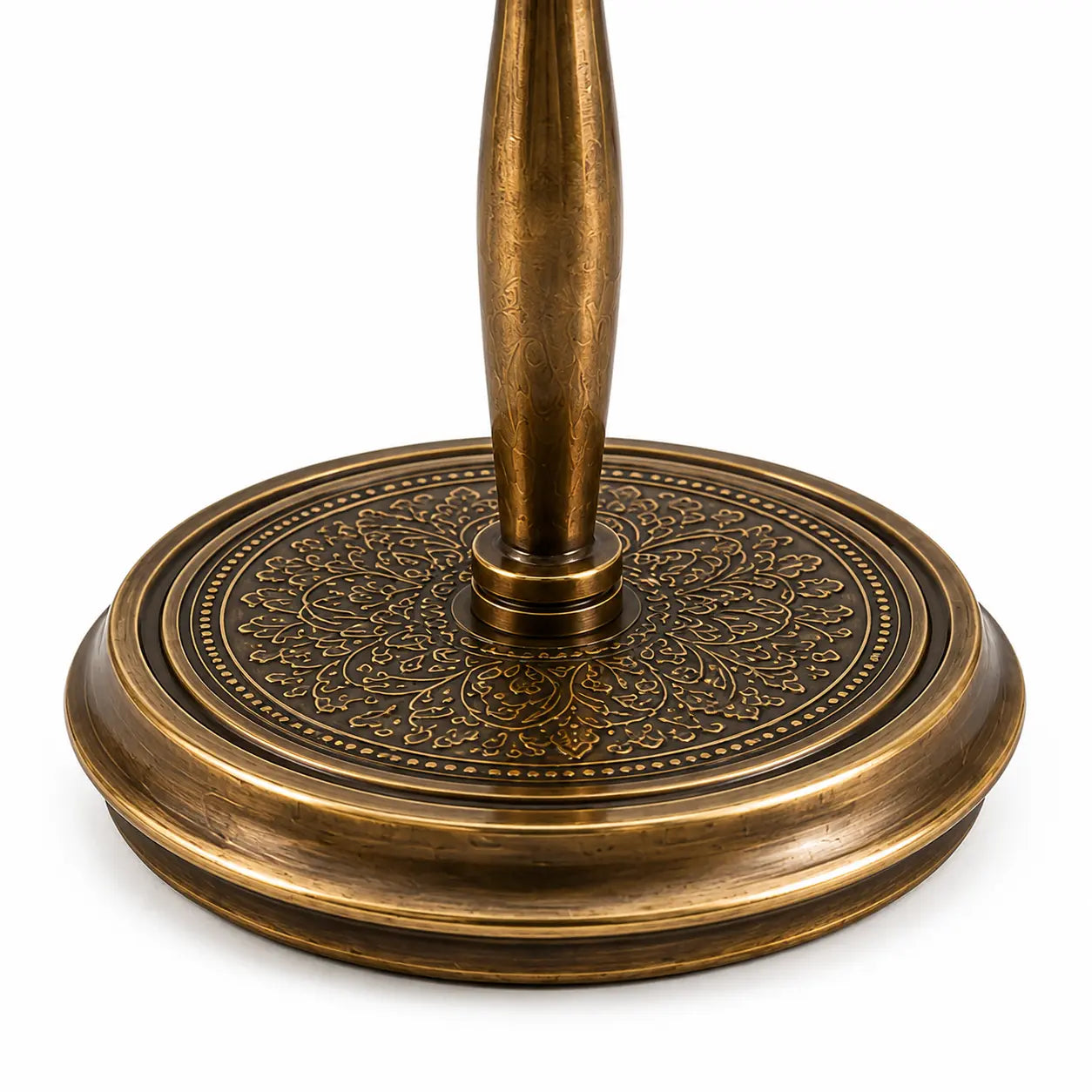 Close-up of engraved brass base.