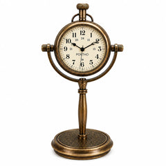 Front view of antique brass desk clock