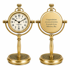 Two antique-style gold brass desk clocks shown side by side on a white background. The left clock has a round white dial with black numerals and hands, and the word 'POTHO' on the face.