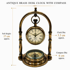 An antique brass desk clock with an integrated compass, shown with dimension labels indicating a full height of 17 cm, a clock diameter of 5.5 cm, and a compass diameter of 6 cm.