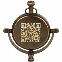 A round antique bronze pocket watch case with a QR code printed in the center, isolated on a white background.