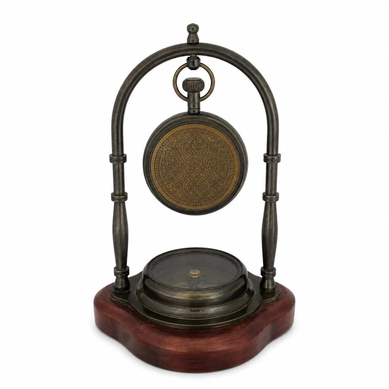 Rear view of brass desk clock with engraved clock back and compass base
