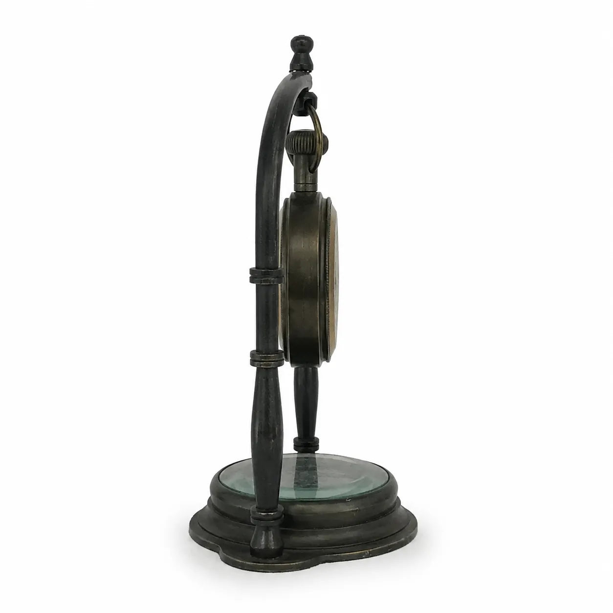 Side profile of antique brass hanging desk clock with compass base