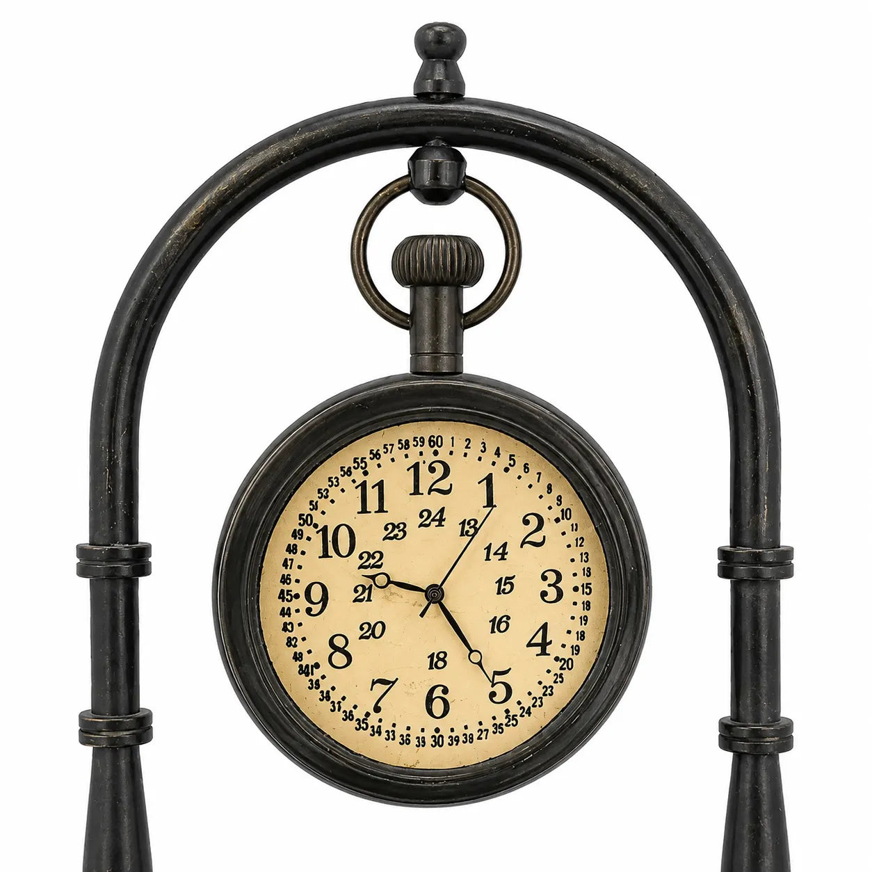 Close-up of antique brass desk clock face with black Arabic numerals