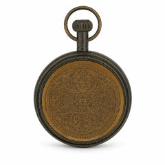 Close-up of decorative engraved back on brass desk clock