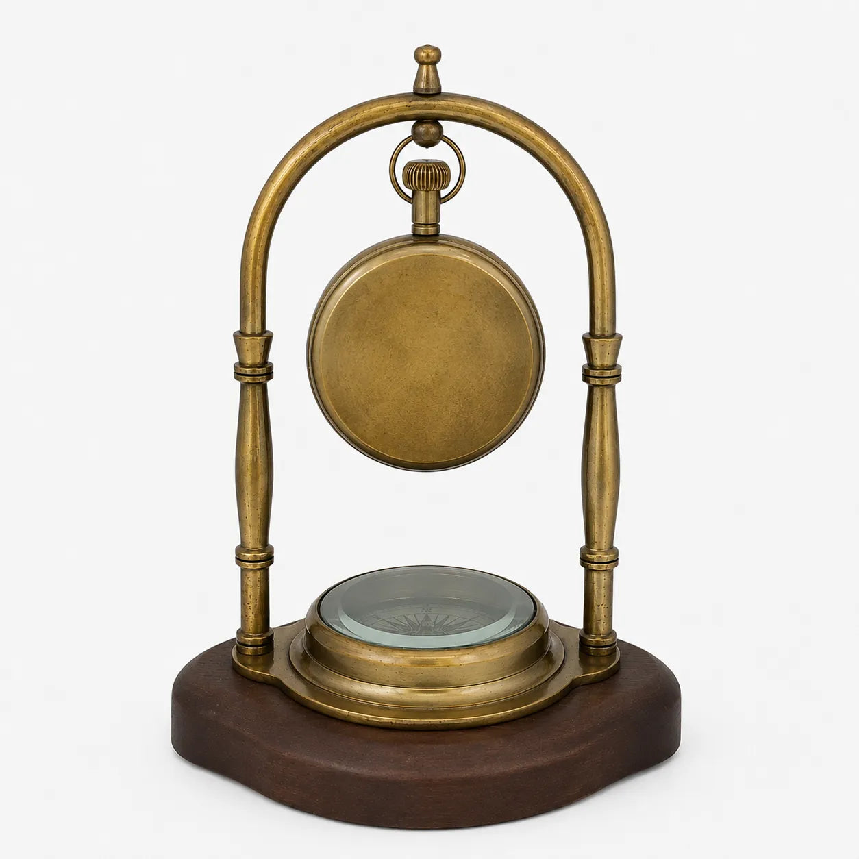 Full rear view of brass desk clock with plain clock back and compass base