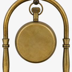 Close-up of plain smooth brass back on Victoria London desk clock