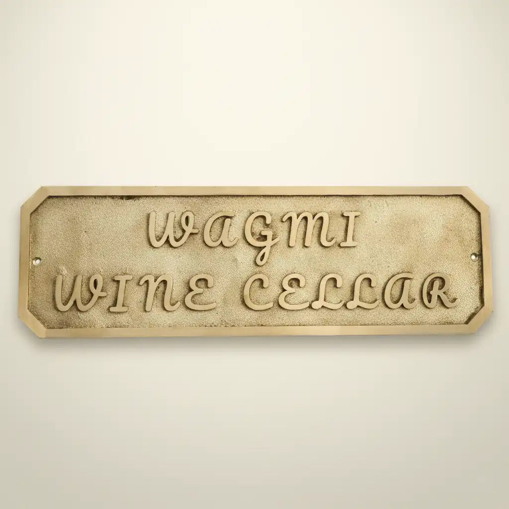 Decorative sign Custom brass name plate for door on a beige background