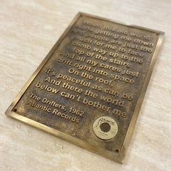 Personalized bronze memorial plaque with decorative engraved design