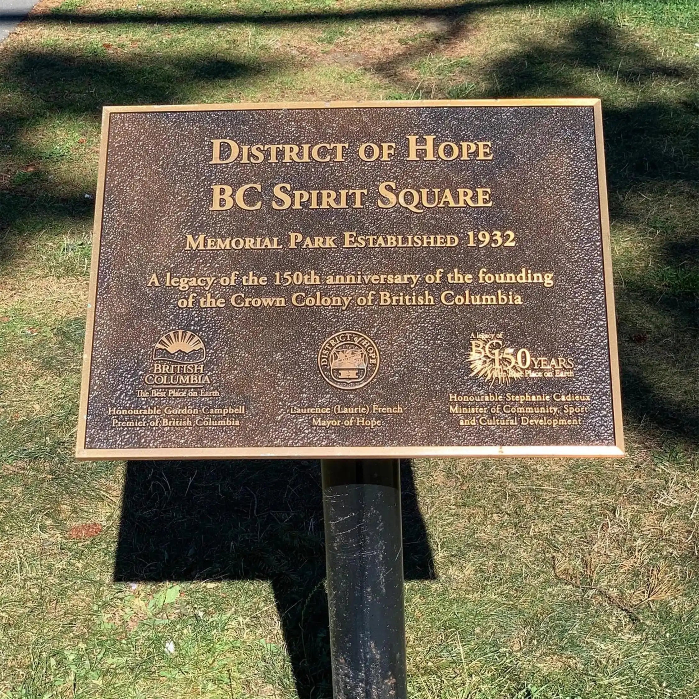 Memorial plaque for District of Hope BC Spirit Square in a park setting