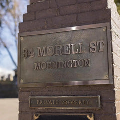 Outdoor bronze address plaque | Bronze plaque for building entrance