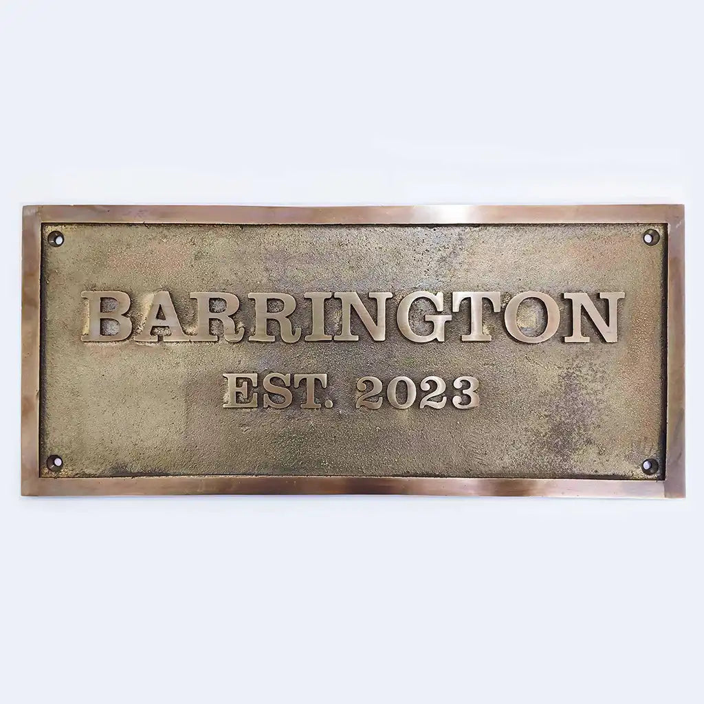 Bronze plaque on a white background, custom bronze name plate for doors